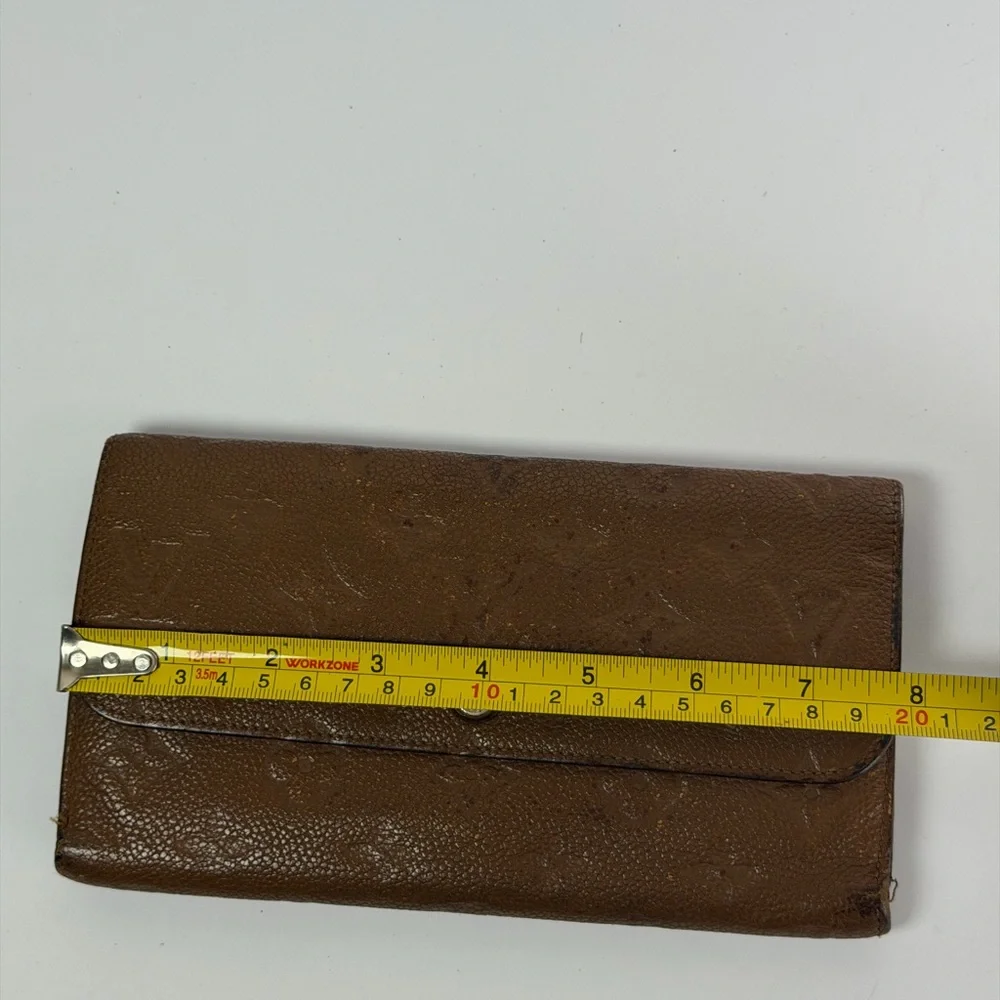 Louis Vuitton Virtuose Wallet Crafted Brown Monogram Empreinte Leather